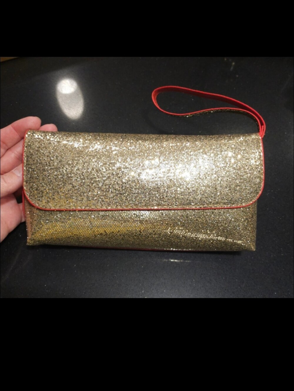 Estee Lauder Gold Glitter Clutch with Red Trim and Wrist Strap